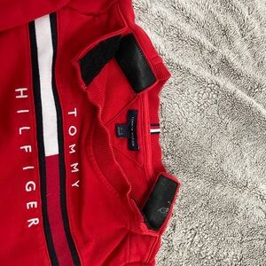 Boys medium Tommy Hilfiger sweatshirt. Velcro shoulder openings.